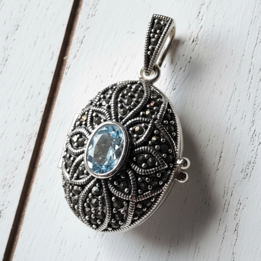 Oval Blue Topaz Locket Pendant Sterling Silver
