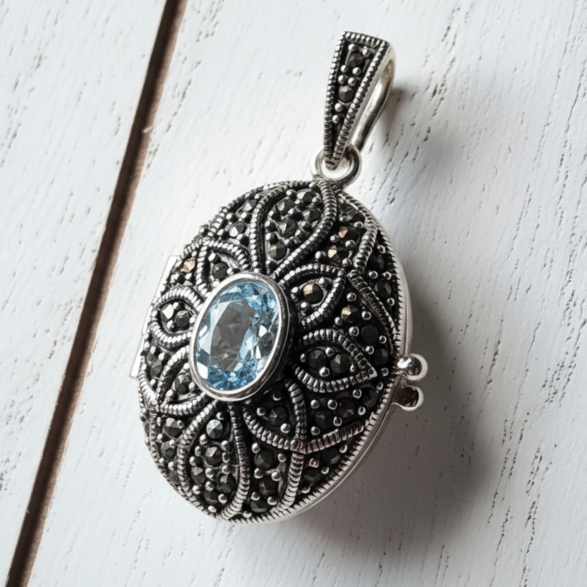 Oval Blue Topaz Locket Pendant Sterling Silver